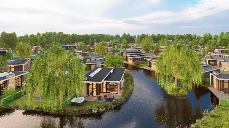 Luchtfoto van het waterpark met moderne villas en treurwilgen langs de vaarten