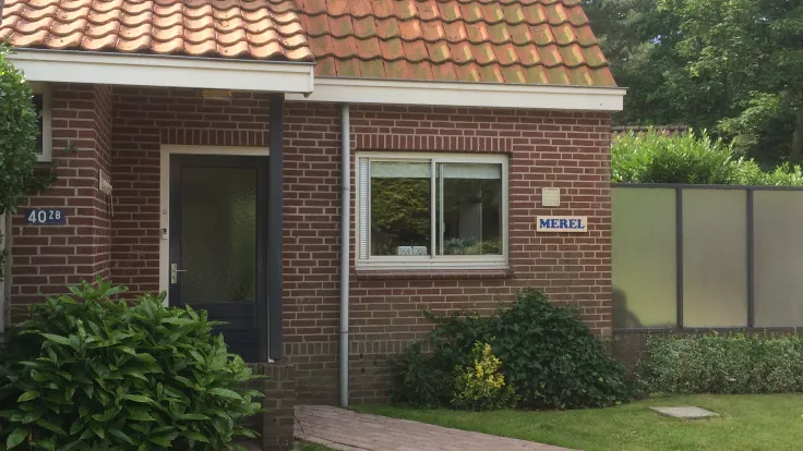 Voorkant en entree huisje "de Merel"